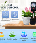 3 In 1 Soil Moisture, Nutrients, and pH Tester Kit for Garden, Lawn, Grass, Indoor and Outdoor Plants for Busy Green Thumbs Easy to Read Soil Meter for Quick, Accurate Checks. Black analog soil meter in potted plants