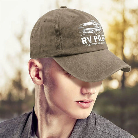 Person wearing Funny RV Pilot Hat For Women Saying Enjoy The Journeys Camper Road Trip Vacation Cap With Adjustable Strap.