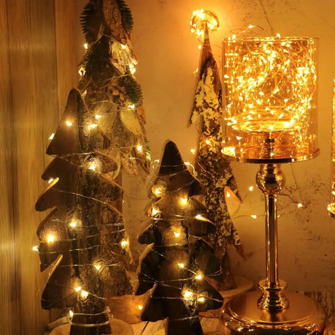 Glowing 20 LED Fairy Lights On 6.5ft Silver Wire Battery Powered With Timer, Warm White Glow, on wood and bronze decor