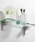 14 Inch Tempered Glass Bathroom Shelf With Wall Mount Brushed Nickel Brackets 8mm Thick Clear Glass holding toiletries