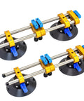 Two 6-inch stone seam setters with vacuum cups; yellow and blue clamps for quartz countertops.