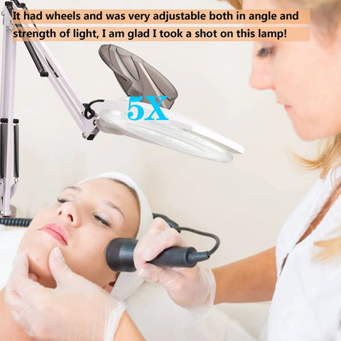 Ultra Bright 5X Magnifying Floor Lamp With Rolling Base in use by esthetician, featuring adjustable stand and swivel arm, white