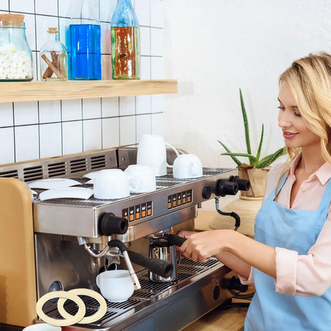 Woman installing 54mm Silicone Steam Ring Replacement Gasket for Espresso Machines Dope Fit on Breville and Sage models