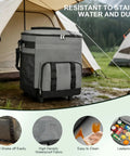 60 Can Rolling Cooler Bag With Wheels Leakproof Insulated Soft Cooler shown by a tent, features waterproof fabric and storage pockets.