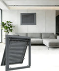 Heavy Duty Twenty By Twenty Six Inch Gray Return Air Filter Grille Featuring Slick Hinged Door in modern living room.