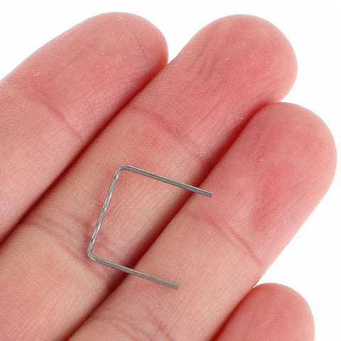 High Performance Hot Plastic Bumper Repair Welding Staples For Auto Body Work With Precision 0.8mm Rods, shown in hand.