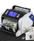 Mixed Denomination Money Counter With Touchscreen Display And Fast Counting Up To 1500 Bills Per Minute, showing cash and screen
