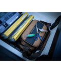 Guide Series 3500 Soft Tackle Bag With Five 3500 Stowaway Boxes, rugged 1680 Denier fabric, on a boat with tools.