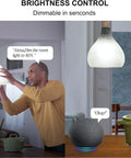 Man adjusting WiFi Smart LED Bulbs 100W Equivalent 1500 Lumen Dimmable A19 Daylight 5000K with Alexa command, smart speaker visible.