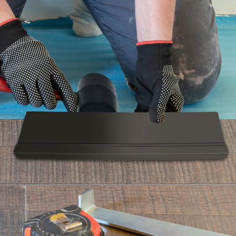 NAACOO tapping block for vinyl plank flooring, black, angled view, double-sided with notches for tongue-and-groove or click-lock.
