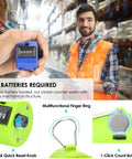 Hustle Ready 6 Pack Mechanical Tally Counters With 4 Digit Dials And Bright Assorted Colors For Snappy Team Tracking At Sports Pitches Warehouse Floors Or Block Parties, held by a worker in an orange vest, featuring battery-free mechanical structure and easy reset.