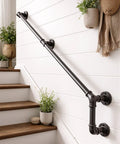 Side view of Twenty Pack Three Quarter Inch Malleable Cast Iron Pipe Flange Set installed as a handrail on a staircase