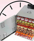 Built Different Commercial Food Dehydrator With 10 Layer Stainless Steel Professional Electric Dryer Machine displaying various dried fruits and snacks.