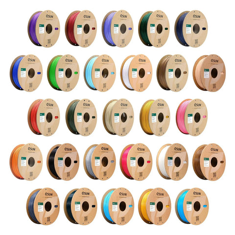 Variety of 3D printer filament spools in different colors, including PLA Plus 1.75mm 1kg Bone White Filament For 3D Printers High Precision