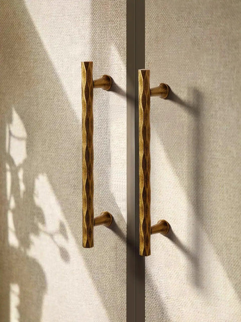 Hammered Antique Brass Cabinet Pulls 5 Inch Center Hole 10 Pack Vintage Vibe Handles installed on cabinet doors