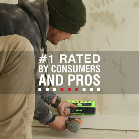 Person using 13 Sensor ProSensor M210 Stud Finder for wood and metal studs against a wall with a power tool nearby.