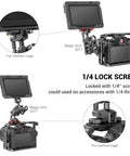 Badass Low Profile NATO Rail Quick Release Safety Mount Fifty Millimeter Long Camera Cage Accessory With Standard Thumbscrews attached to a camera rig.