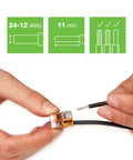 Hands using 221-412 Compact Lever Nuts Splicing Connectors, 2-Conductor, 24-12 AWG with wire gauge and insertion depth details.