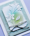 Greeting card showcasing 7 Piece Rectangle Frame Die Cut Set With Stitched Nesting Frames for DIY scrapbooking, featuring floral design.