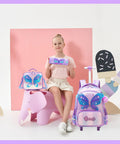 Girl with children's butterfly rolling backpack, lunch bag, and pencil case set