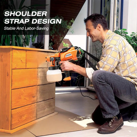 Person using Powerful 800W HVLP Electric Paint Sprayer With LED Light, 1200ml Cup on wooden furniture, focused on painting detail.