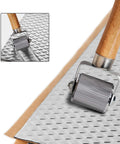 Sound Deadening Roller Kit For Auto Noise Reduction Three Piece Pro Grade Set With Metal Roller Wheel on insulation mat.