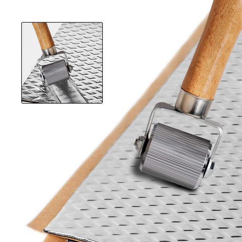 Sound Deadening Roller Kit For Auto Noise Reduction Three Piece Pro Grade Set With Metal Roller Wheel on insulation mat.