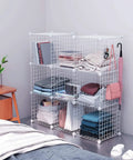 Eight Cube Wire Storage Organizer Kit with Metal Grid Shelving in bedroom, holding books, clothing, bins, and accessories.