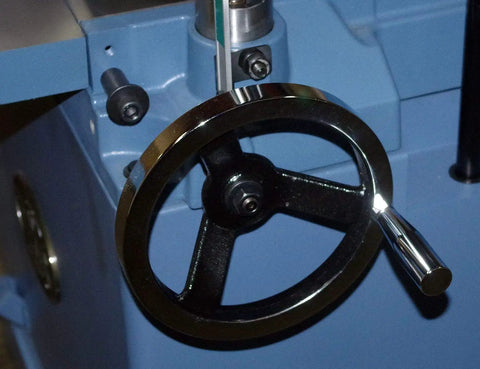 Close-up of adjustment wheel on 20 Inch Planer With Helical Cutterhead, Auto Depth Lock with Twin Nitrogen Cylinders, Heavy Cast Iron Construction