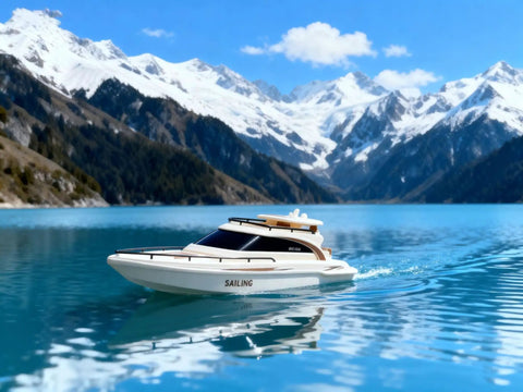 Remote Control Boat 4CH Electric RC Watercraft Yacht Style Sail Cruiser for lake with snowy mountains in background