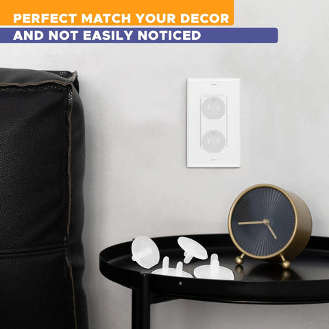 Baby Proof Outlet Covers 36 Pack White No Sweat Easy Press In Fit For Unused Outlets And Socket Safety Caps To Block Little Hands From Getting Shocked At Home shown on a table next to a clock.