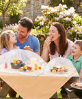 Family enjoying picnic with Outdoor Food Cover Set With Two Extra Large 40 By 25 Inch And Six Large 17 By 17 Inch Pop Up Mesh