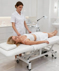 OmySalon Pro Electric Lift Massage Table With Dual Motors For Facial Beauty Salon Spa Therapy in use with client.