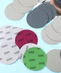 Grab These 24 Inch Round Sanding Discs For Drill With Multi Grit Set From Coarse To Ultra Smooth Finish. 24 pieces showing grit numbers.