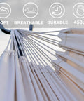 Close-up of weather-resistant cotton fabric from a double hammock with 9 ft space saving steel stand, showcasing durability and softness.