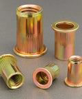 Five zinc plated carbon steel 10-32 UNC rivet nuts with knurled bodies