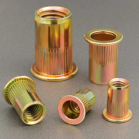 Five zinc plated carbon steel 10-32 UNC rivet nuts with knurled bodies
