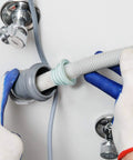 Hands installing Silicone Drain Seal Plug 4 Pack For Toilets, Bathrooms, Kitchens And Washing Machines Odor Control