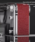 Close-up of the sanding belt on the Tailgate Ready Belt Sander And Bench Grinder Duo, showing stepless speed adjustment.