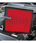 Mechanic holding Engine Air Filter Replacement JMF005 for Toyota Avalon Camry Highlander RAV4 NX250 RX350 ES350 TX350 and GR Corolla