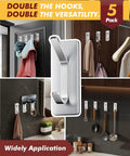 Heavy Duty Stainless Steel Self Adhesive Hooks 15lb Pack of 5 Double Hook Design for Coat Towel Robe No Drill Door Hanger Waterproof Rustproof Oilproof for Bathroom Kitchen RV Office in use in various rooms showing versatility.