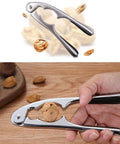 Stainless Steel Nutcracker Seafood Sheller With Dual Diameter Crushing Cones cracking a walnut, showing non-slip handle and design.