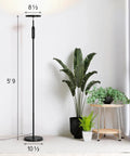 Lit 24W LED Daylight Floor Lamp Free Standing Uplight Torchiere for Living Room with plants and table.