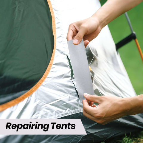 Person using Heavy Duty Duct Tape 1 Point 88 Inch Wide By 90 Feet Waterproof No Residue Hand Tear Bond That Sticks Like Crazy on tent