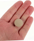 Hand holding a snap rivet from the 10 Piece Car Roof Headliner Repair Kit With Snap Rivets And Retainers For Quick Fixes.