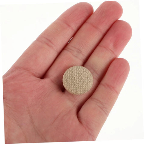 Hand holding a snap rivet from the 10 Piece Car Roof Headliner Repair Kit With Snap Rivets And Retainers For Quick Fixes.