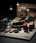 Top Shelf Miniature Vehicle Repair Shop Scene Featuring Resin Seats And Tire Balancing Machine For Collectible Scale Dioramas And Knockout Model Garage Displays with car, tools, and detailed setup.