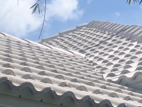 Heavy Duty Tile Roof Glaze And Clear Shielding Sealant With Urethane Reinforced Strength For Tough As Nails Weather Barrier And A Sleek Satin Finish That Gonna Save Your Tiles From Failing In A Practical Five Gallon Size on a textured clay roof.