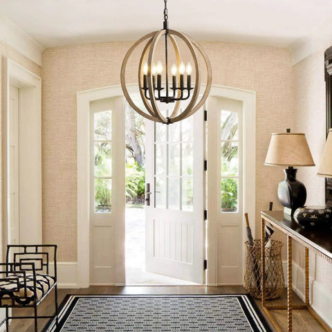 Six Light Orb Farmhouse Chandelier In Brown Wood Globe Handcrafted Solid Wood Light Fixture For Your Dining Room, Living Room, Bedroom, Kitchen Island And Foyer, 20 Inch Diameter Cozy Rustic Vibe hanging in a foyer.