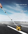 Luocute Mechanical Distance Measuring Wheel 0 to 9999.9m (small wheel) being used on a road with an adjustable handle for ease.